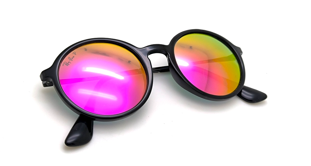 عینک آفتابی گرد مسترکوالیتی ری‌بن RayBan با فریم مشکی و عدسی صورتی-بنفش آینه ای | کد RB4222
